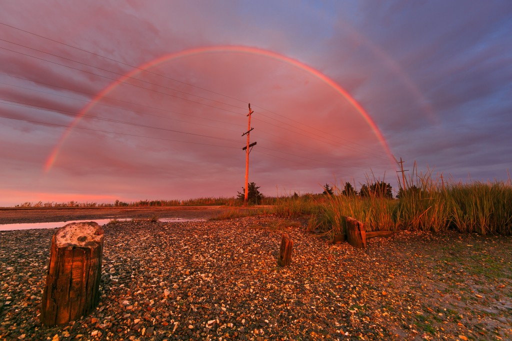 Photograph of a double rainbow that formed opposite the setting sun on Great Bay Boulevard in Little Egg Harbor Township