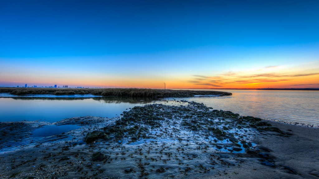 An HDR photograph taken from the southern side of Edwin B. Forsythe National Wildlife Refuge overlooking the Atlantic City skyline at sunset.