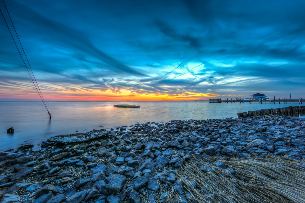 An HDR photograph taken at the end of Cedar Run Dock Road overlooking the bay to the south taken just after sunset.