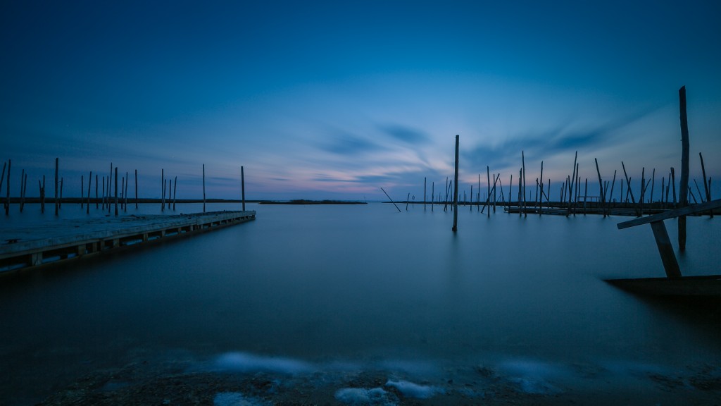 A long exposure photograph overlooking Great Bay during blue hour taken by Manahawkin, NJ photographer Greg Molyneux from an abandoned boat ramp on Great Bay Boulevard.