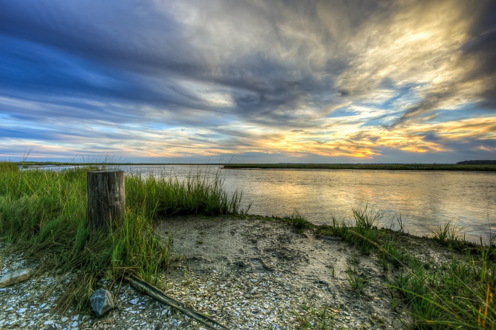 An HDR photograph taken of the salt marsh on the south side of Great Bay Boulevard during golden hour.