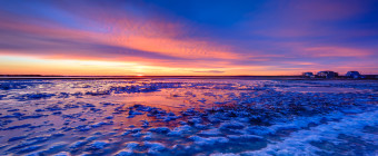 After Winter Storm Juno skirted the Jersey shore sparing New Jersey from historic snow, the clouds break revealing a sublime winter sunset on the frozen marsh along Cedar Run Dock Road in this HDR photograph.