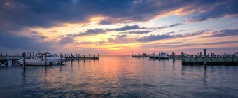 HDR sunset photograph of clouds, water, boats, docks and light made from Beach Haven, LBI. overlooking Little Egg Harbor