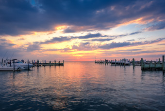 HDR sunset photograph of clouds, water, boats, docks and light made from Beach Haven, LBI. overlooking Little Egg Harbor