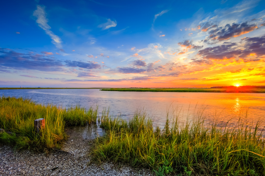 HDR photograph of a summer sunset over marsh and estuary