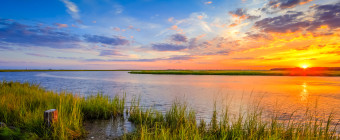 HDR photograph of a summer sunset over marsh and estuary