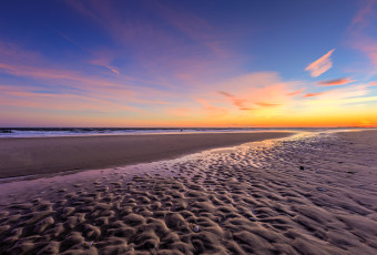 Landscape photograph of Holgate, NJ, beaches under a pastel winter sunset