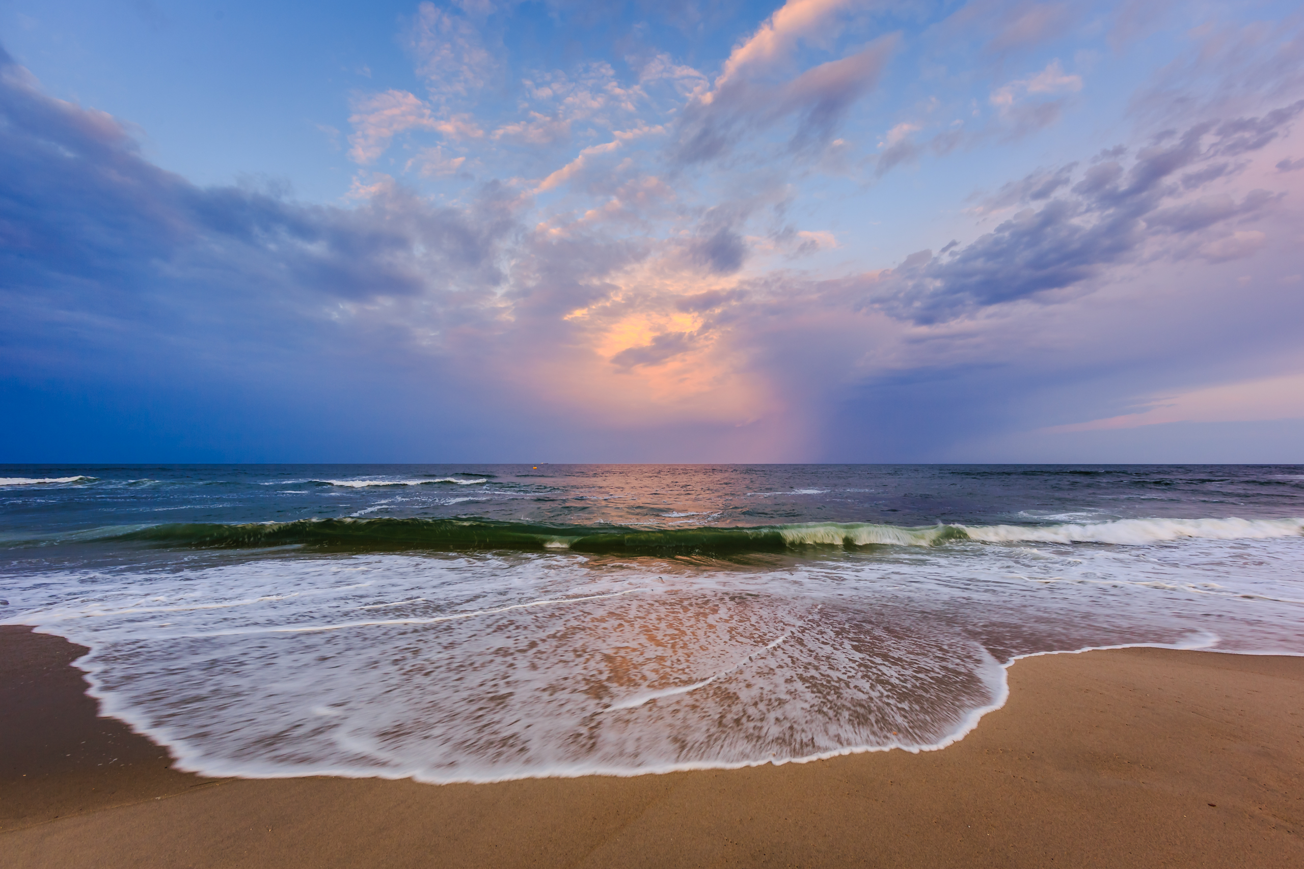 Wide angle photograph of blue hour on the beaches of Surf City, Long Beach Island.