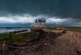 Photograph capture of fierce clouds and thunderstorms approaching Antoinetta's restaurant from the west.