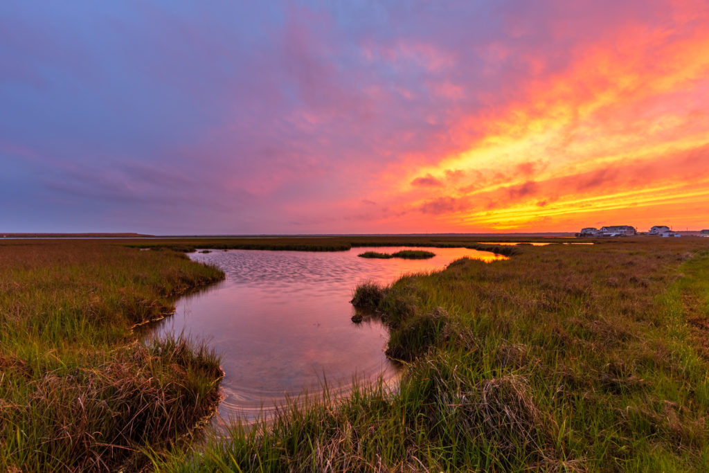 A high powered sunset ignites over the salt marsh as we move toward summer. Photographed at 14mm and merged and processed for HDR.