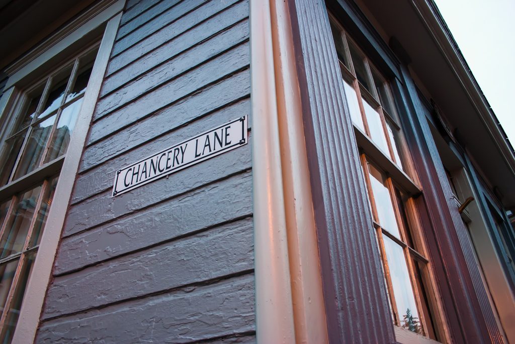 A Chancery Lane street sign and architectural details in Annapolis, Maryland.